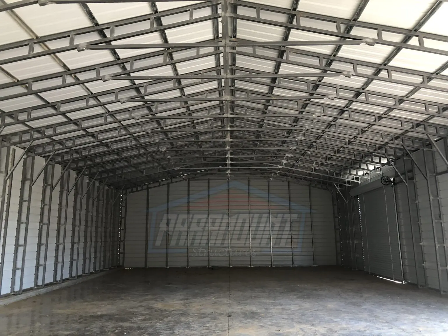 A garage with a metal roof and metal walls.