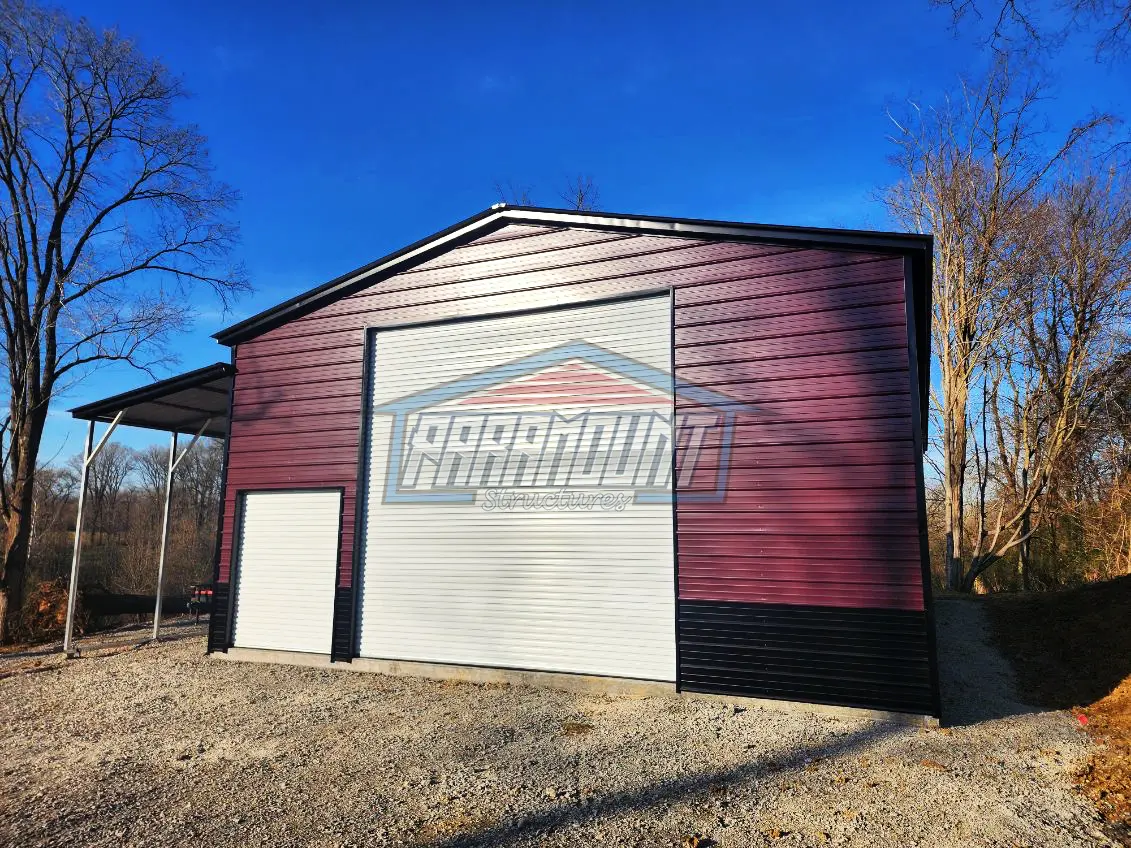 A metal building with two garage doors.