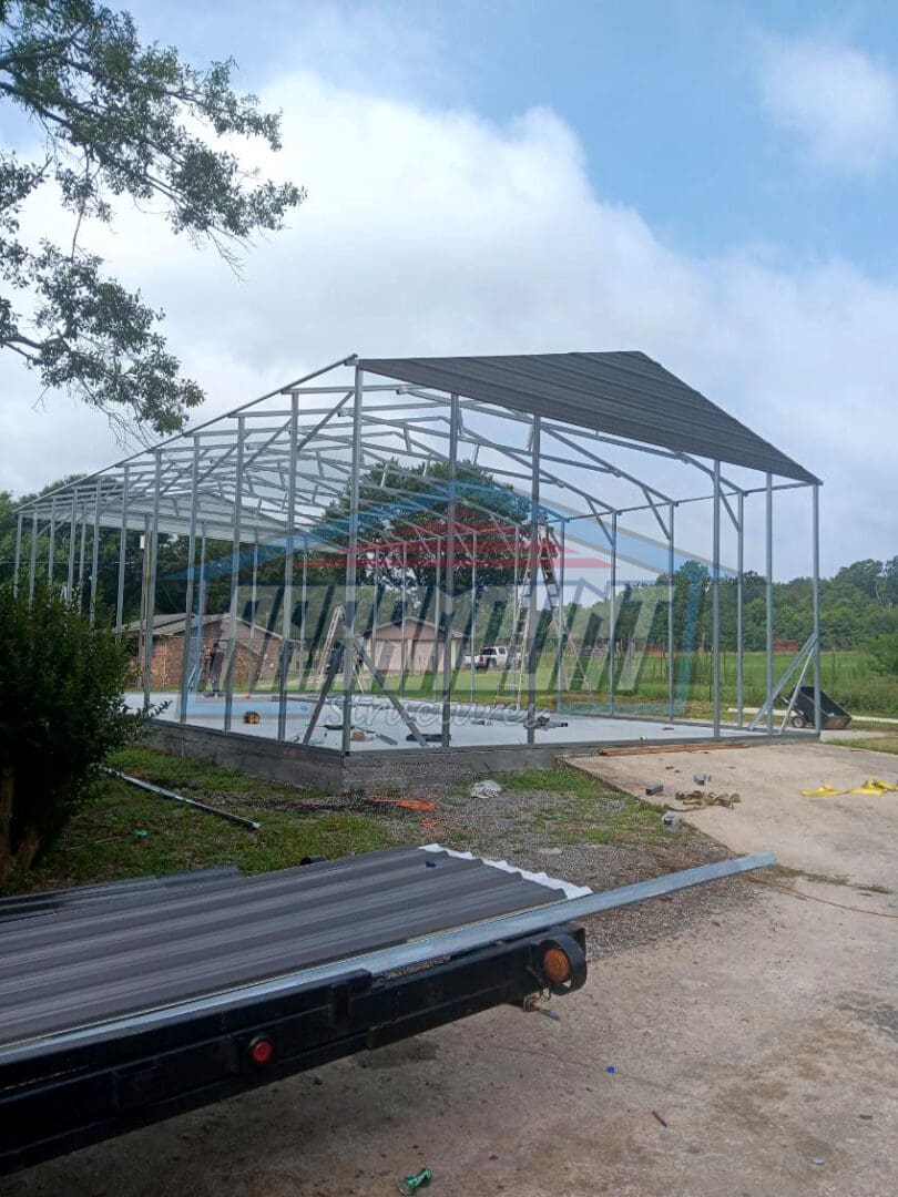 Metal frame building under construction.