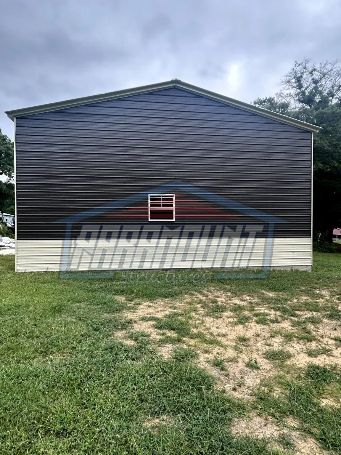 Metal building with a single window.